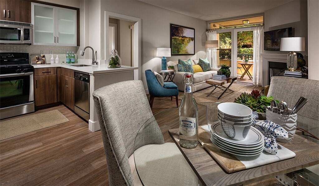 Furnished living and dining room - shows remodelled kitchen