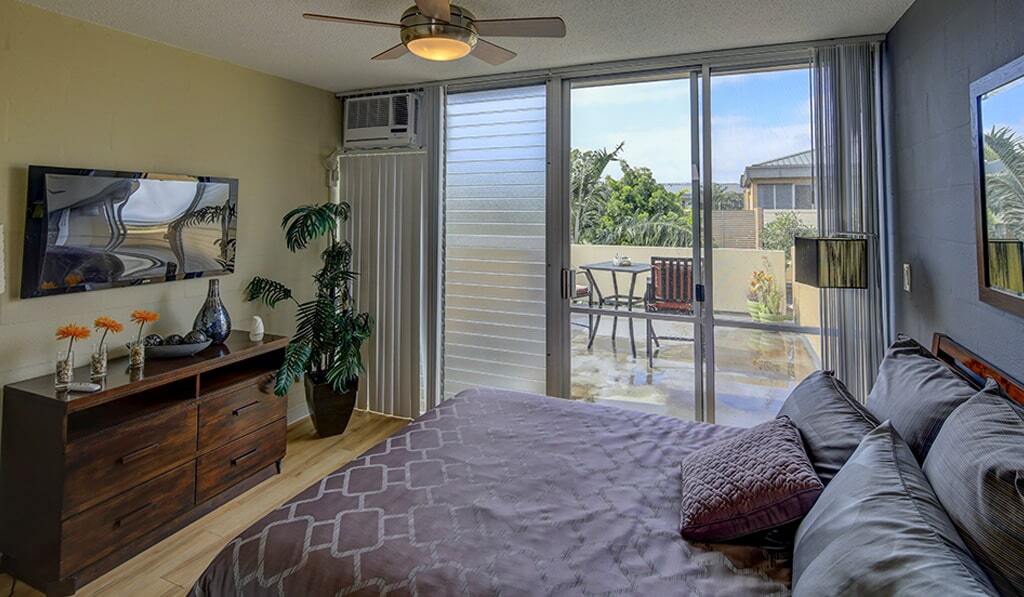 Waena bedroom leads to patio